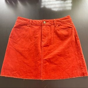 Miniskirt-Orange Corduroy, zipper and button on the front of the skirt